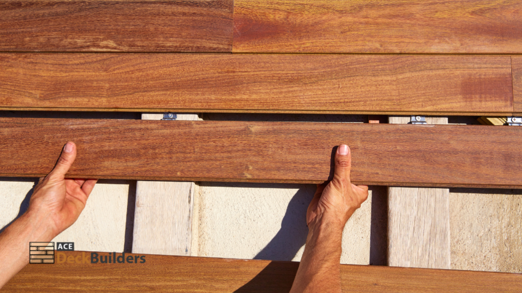 person placing deck board